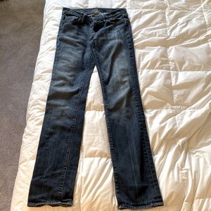 Straight leg medium-dark blue jeans.